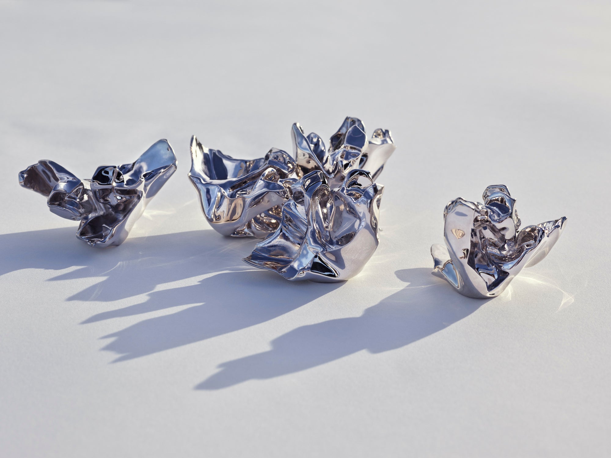 Uzávěry flakonů Les Extraits od Franka Gehryho