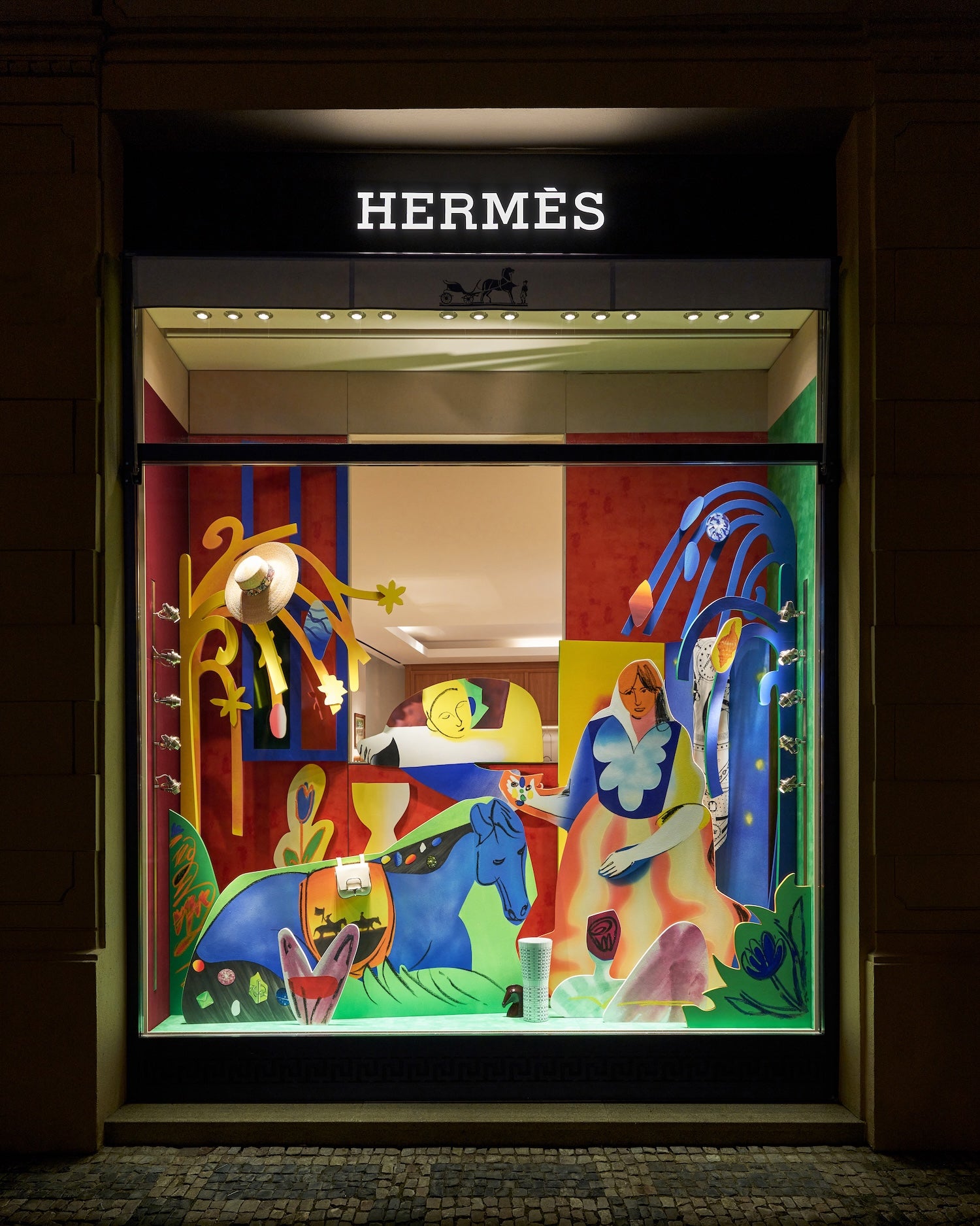 Mystická zahrada v srdci Prahy. Nové výlohy Hermès od Anny Kyjovské
